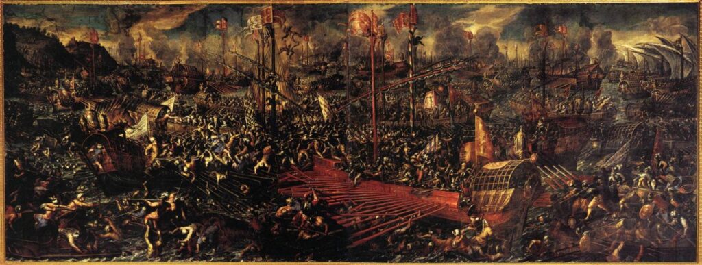 Andrea Vicentino's panorama of the Battle of Lepanto: the Christian and Ottoman galleys locked together across the Gulf of Patras, oars and boarding-planks out, smoke and banners along the whole line.